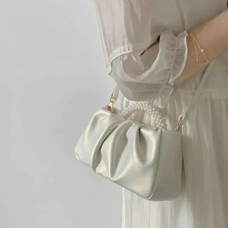 Pochette soirée avec poignée de perles