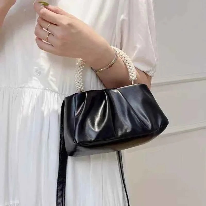 Pochette soirée avec poignée de perles
